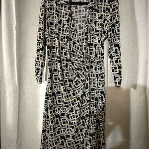 Elegant Black and Cream Geometric Print Dress